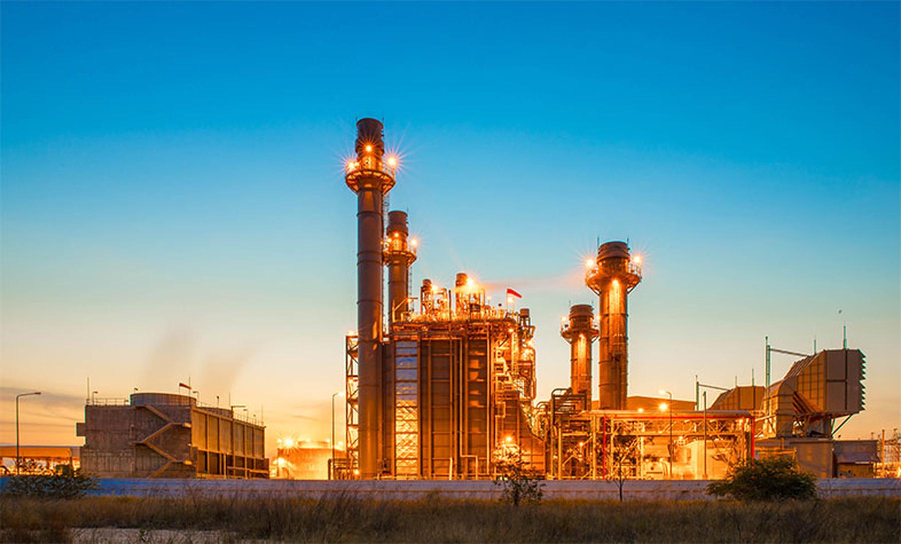 Industrial refinery representing Genesis activity in 2021