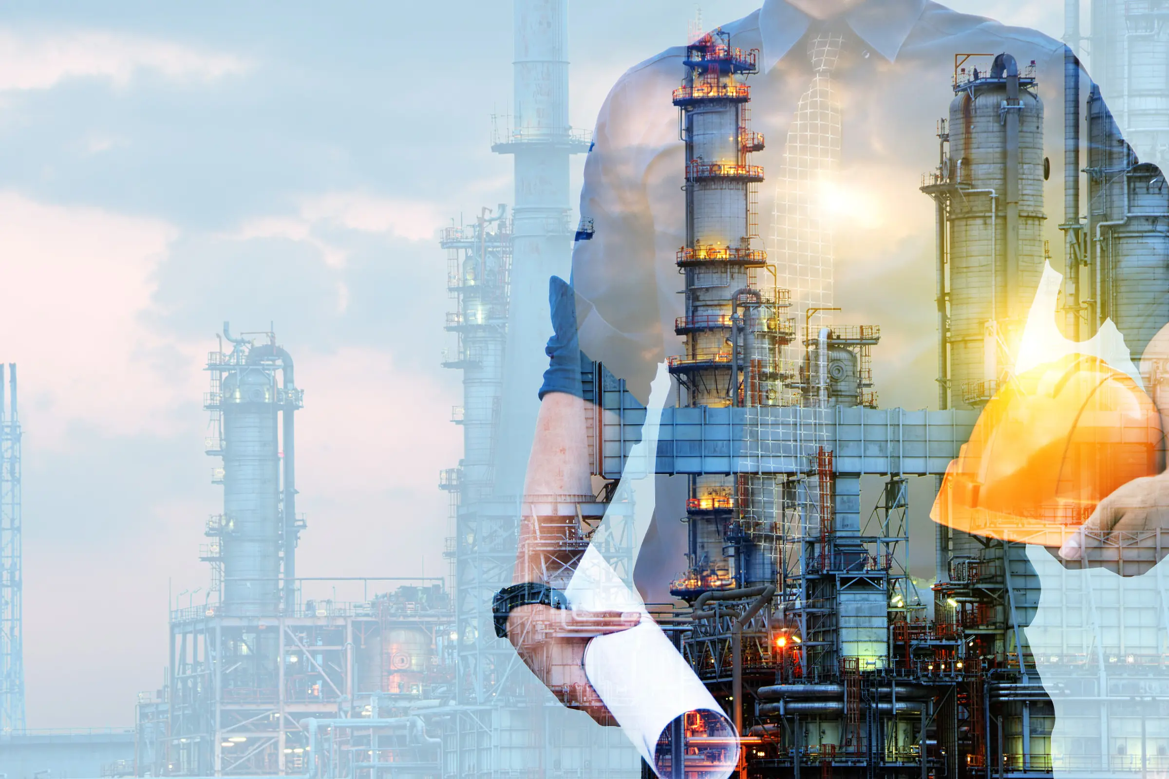 Industrial refinery and engineers representing Genesis growth ambitions
